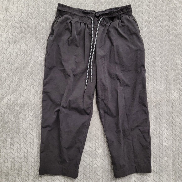 Athleta Trekkie Straight Crop Black Pants Sz‎ 6 Pockets Drawstring Waist Nylon - Picture 1 of 12